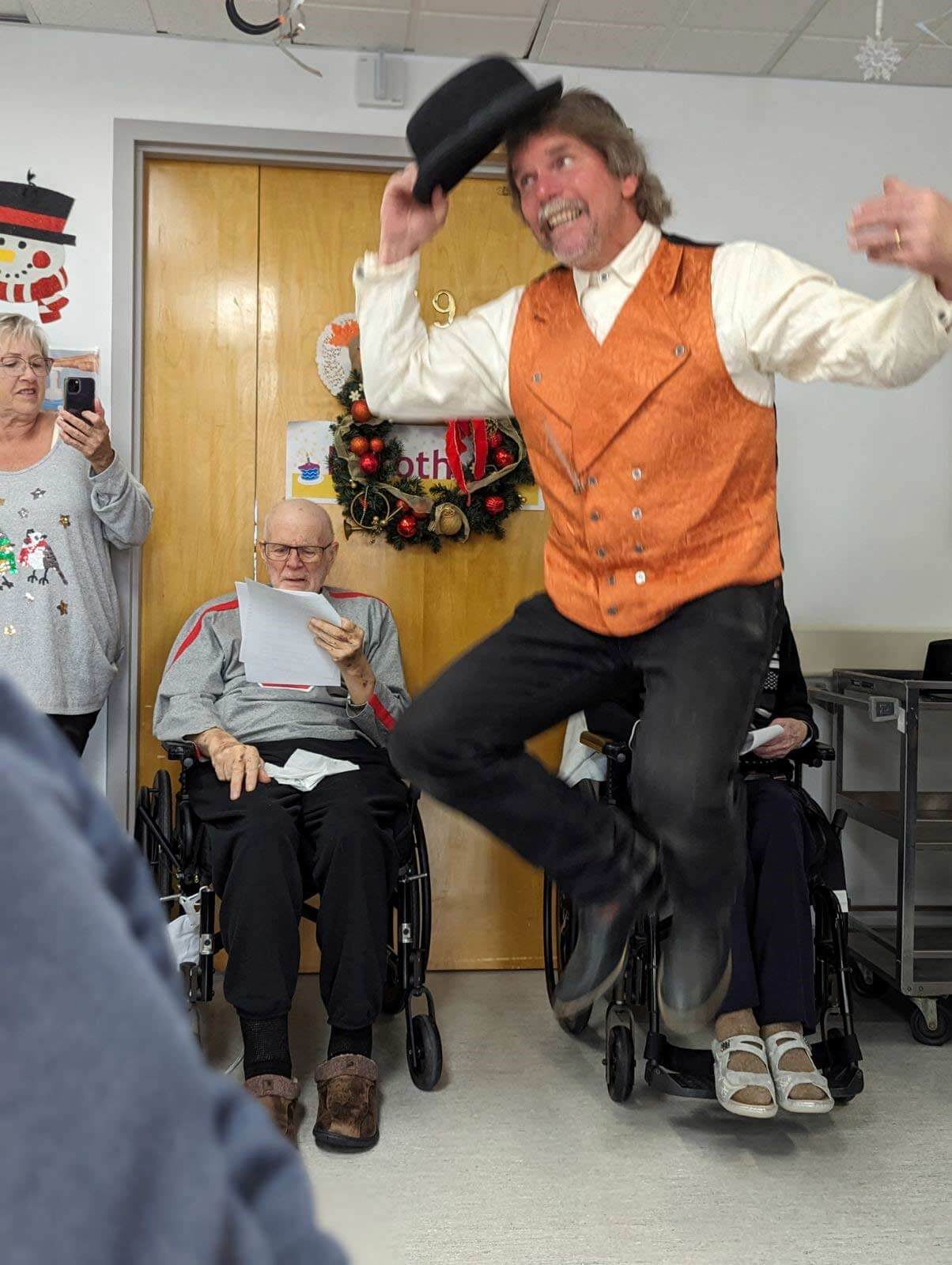 Chaplain Nick Wasylowich acts out Day 10 of The Twelve Days of Christmas