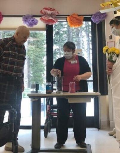 A mock wedding being performed at St. Martha's Place long-term care facility