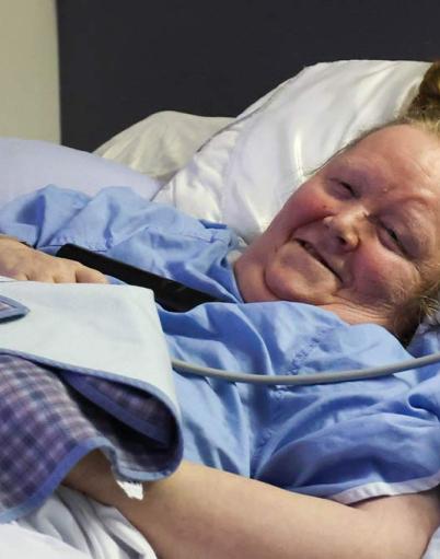 Dianna Sangster on a hospital bed at the Edmonton General Continuing Care Centre