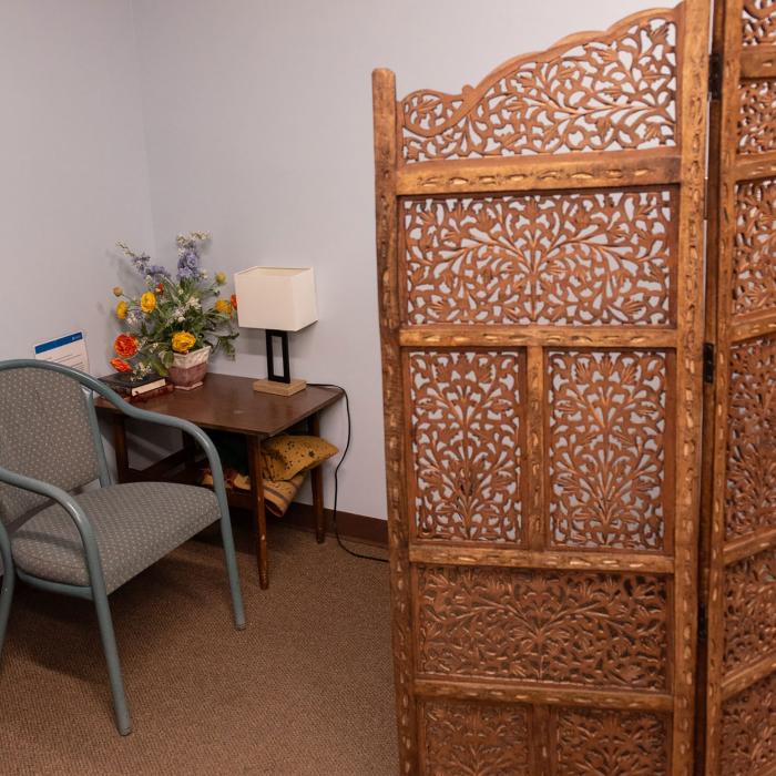 Multifaith room with seating and accent table